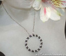 Pretty Circle Pendant with Black & White Diamonds