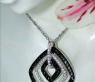 Sophisticated Black & White Diamond Pendant