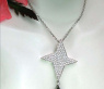 Extravagant Black & White Diamond Star Pendant