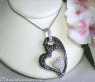 Charming Black & White Diamond Heart Pendant