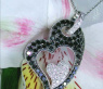 Charming Black & White Diamond Heart Pendant