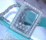 Pretty Diamond Pendant behind Glass