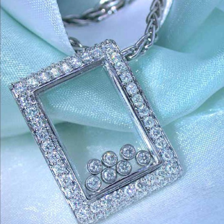 Pretty Diamond Pendant behind Glass