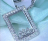Pretty Diamond Pendant behind Glass