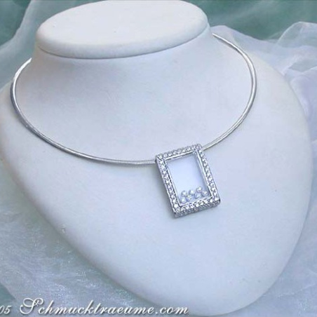 Pretty Diamond Pendant behind Glass
