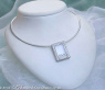Pretty Diamond Pendant behind Glass