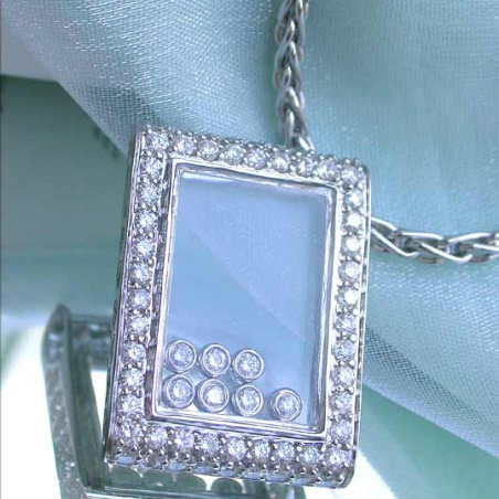 Pretty Diamond Pendant behind Glass