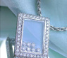 Pretty Diamond Pendant behind Glass