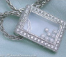 Pretty Diamond Pendant behind Glass