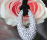 Opulent Diamond Donut Pendant on a Satin Cord
