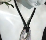 Opulent Diamond Donut Pendant on a Satin Cord