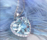 Delicate Aquamarine Heart Pendant with Diamonds