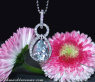 Delicate Aquamarine Teardrop Pendant with Diamonds