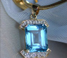 Pretty Blue Topaz Diamond Pendant