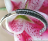 Brillanten & schwarze Diamanten Armreif