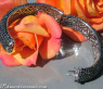 Armreif mit schwarzen Diamanten