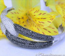 Brillanten Armreif mit schwarzen Diamanten