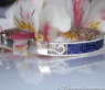 Stately Sapphire Bangle with Diamonds
