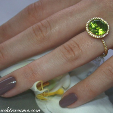 Interesting Peridot Diamond Ring