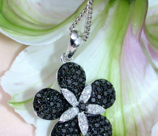 Radiant Black & White Diamond Flower Pendant