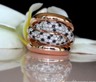 Solid ring with black diamond, natural brown & white diamonds