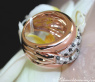 Solid ring with black diamond, natural brown & white diamonds
