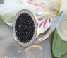 Elegant diamonds & black diamond ring