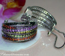 Earrings with black diamonds, amethysts and sapphires