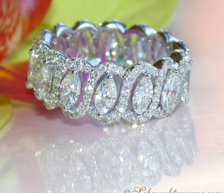 Magnificent diamonds eternity ring with marquise diamonds