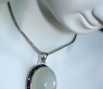 Fancy Moonstone Pendant with Black Diamonds