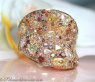 Magnificent Ring with natural colored Diamonds