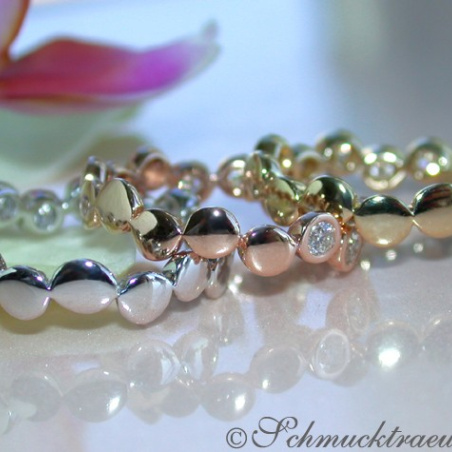 Three handsome stacking rings with diamonds