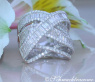 Überkreuzter Brillanten Ring mit Baguette Diamanten