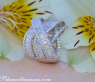 Überkreuzter Brillanten Ring mit Baguette Diamanten