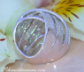 Überkreuzter Brillanten Ring mit Baguette Diamanten