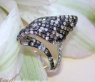 Extravagant Ring with black, white & natural brown Diamonds