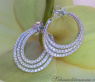 Interesting three row diamond hoop earrings