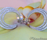 Interesting three row diamond hoop earrings