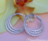 Interesting three row diamond hoop earrings