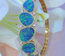 Stately Boulder Opal Bangle with Diamonds