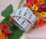 Überkreuzter Brillanten Ring mit Baguette Diamanten
