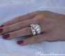 Überkreuzter Brillanten Ring mit Baguette Diamanten 