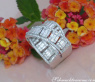 Überkreuzter Brillanten Ring mit Baguette Diamanten 