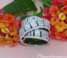 Überkreuzter Brillanten Ring mit Baguette Diamanten 