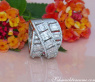 Überkreuzter Brillanten Ring mit Baguette Diamanten 