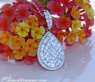 Unique Pear Pendant with Brilliant, Princess and Baguette Diamonds