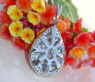 Unique Pear Pendant with Brilliant, Princess and Baguette Diamonds