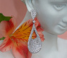 Stately Pear Shape Danling Earrings with Diamonds